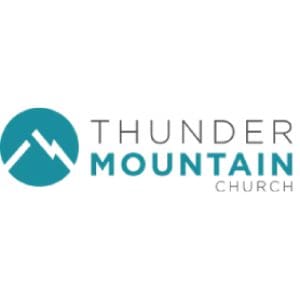 A logo of thunder mountain church