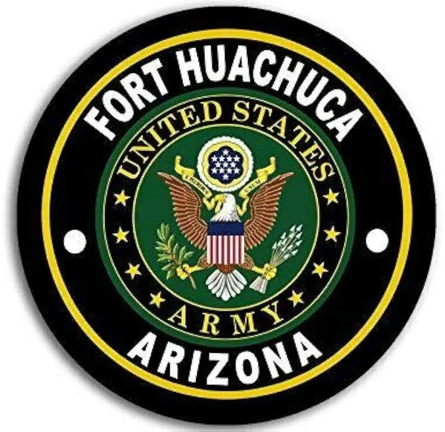 A round black and yellow logo with the words " fort huachuca arizona."